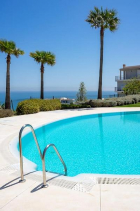 Sunny terrace with Jacuzzi in El Higueron by Costarentals - Ref 26